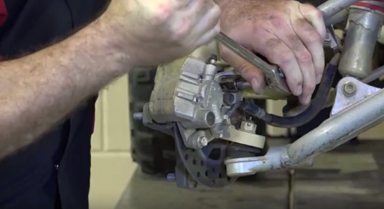 Honda TRX ATV front brake pads replacement