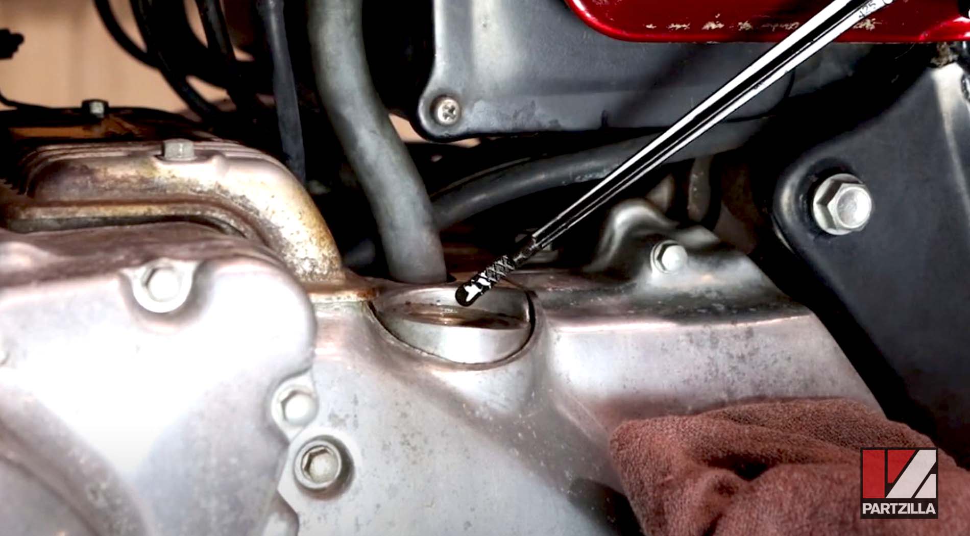 Motorcycle oil change mistakes to avoid dipstick