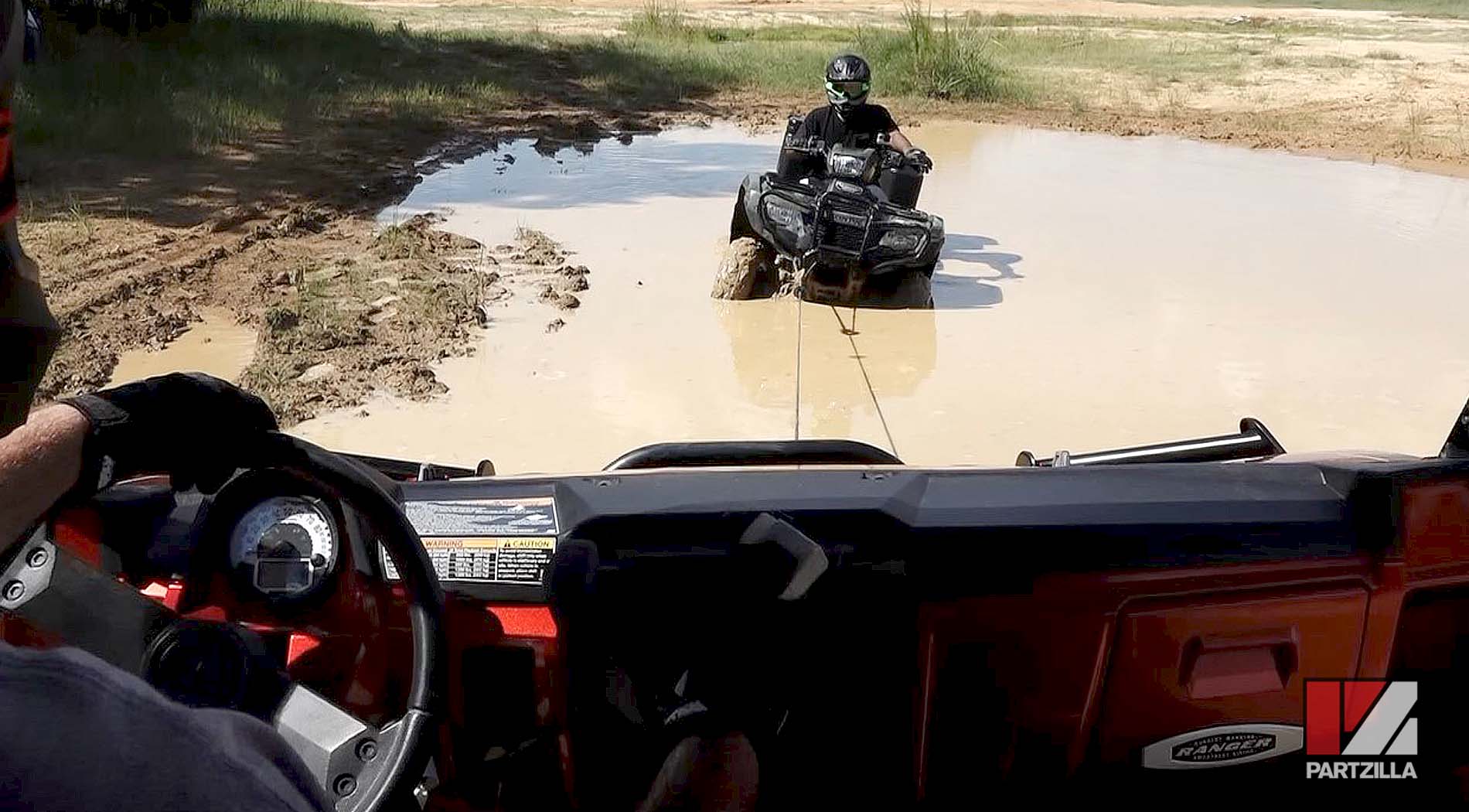 ATV stuck in mud electric winch