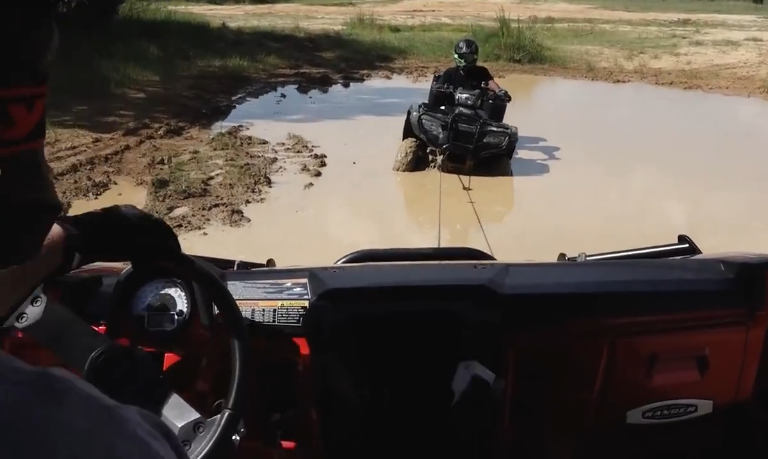 ATV stuck in mud electric winch
