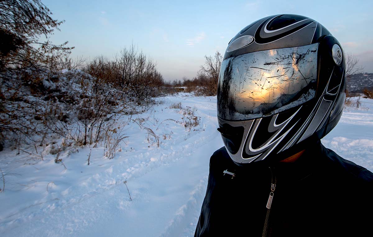 Motorcycle helmet visor tinted
