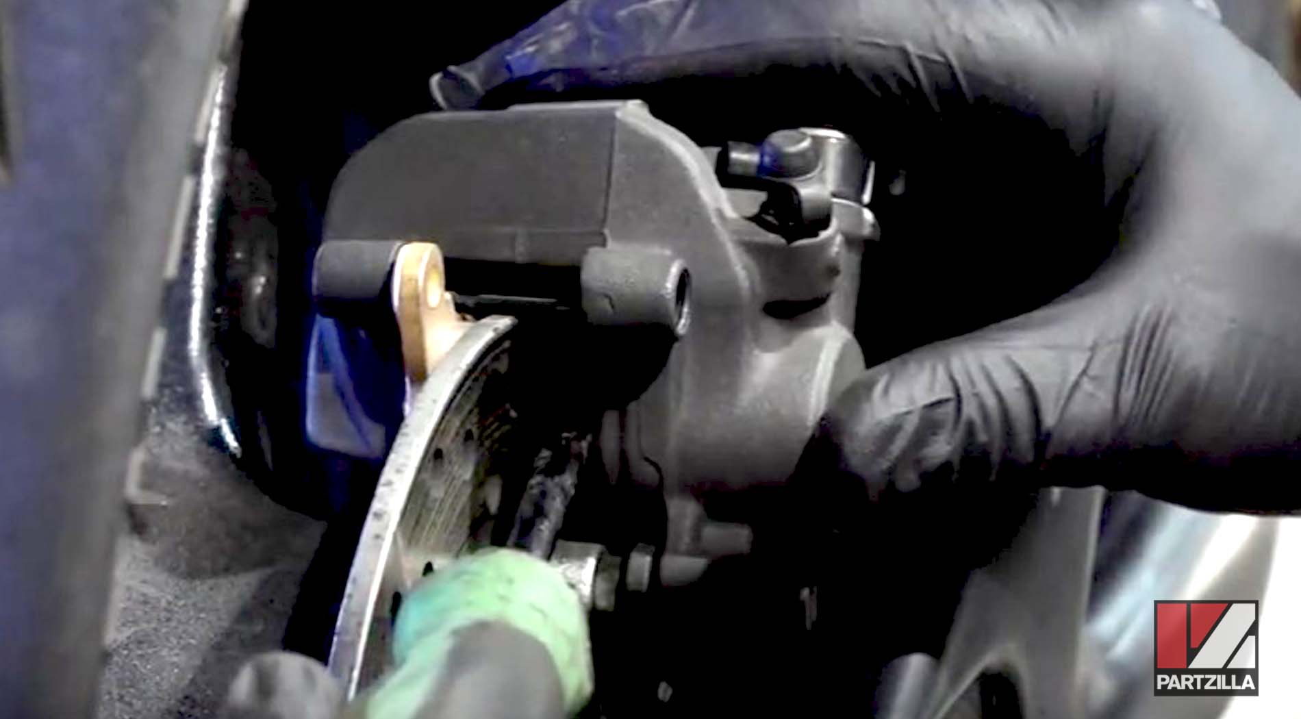 Honda motorcycle rear brake pad change