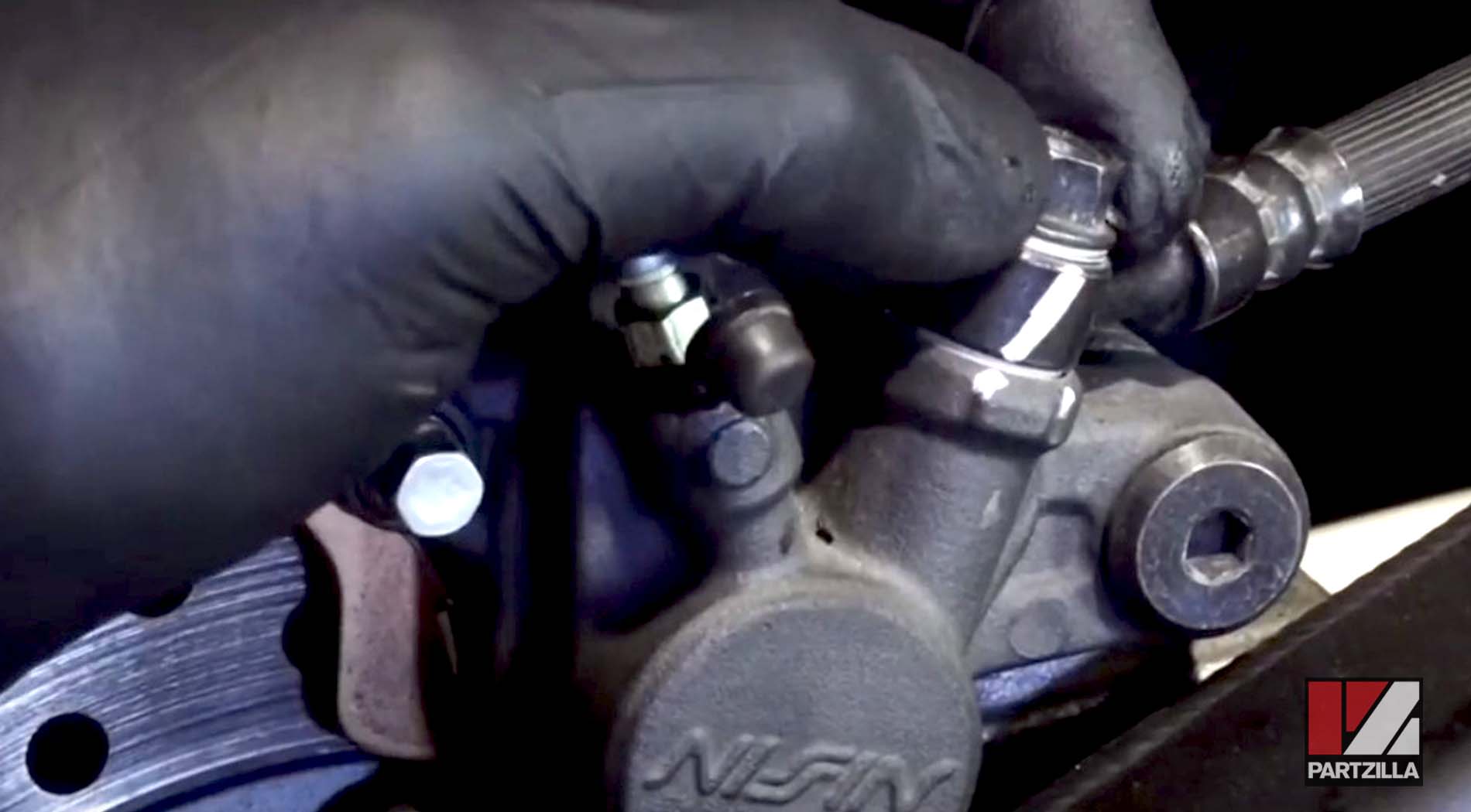 Honda CBR600 motorcycle rear brake caliper rebuild