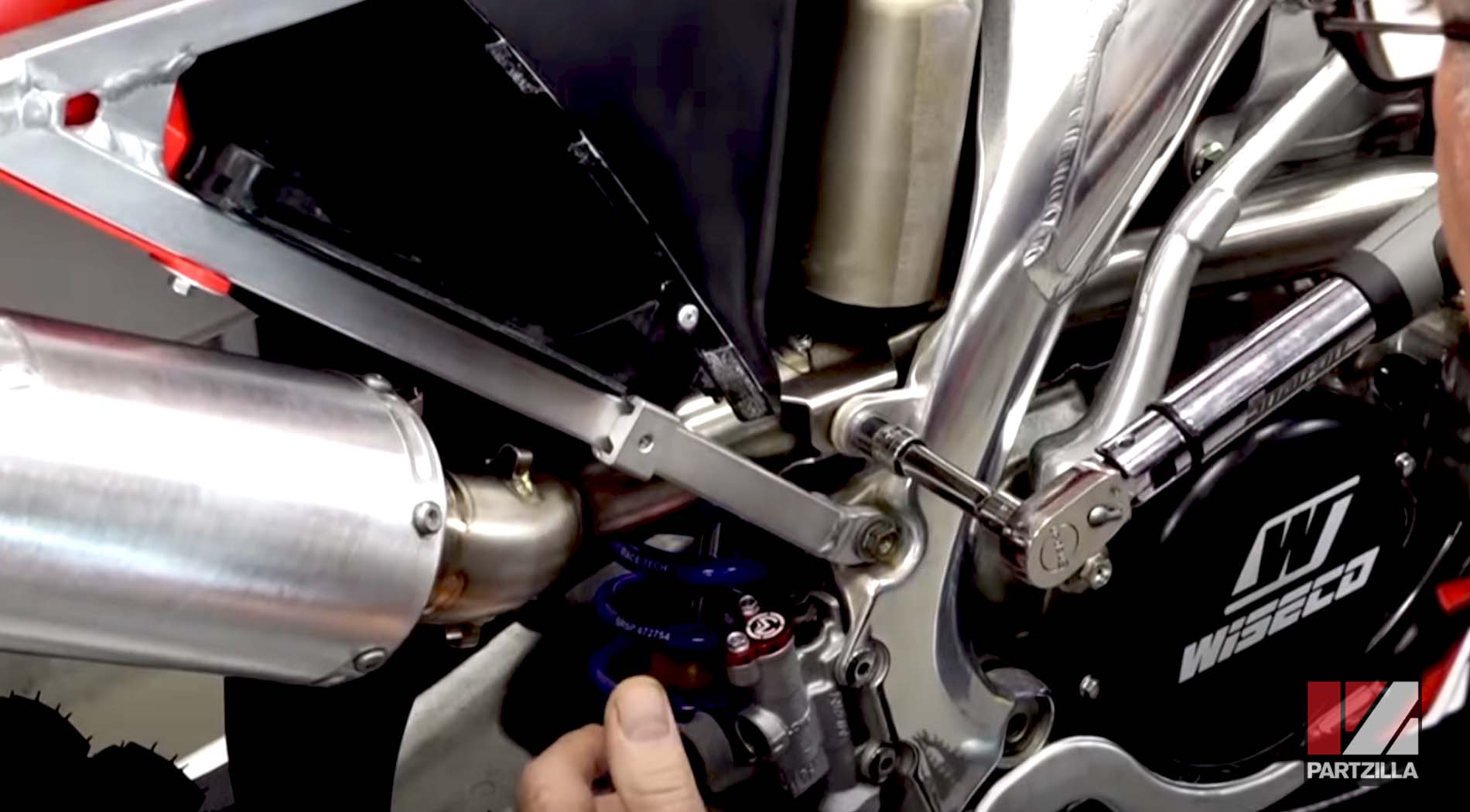 Honda CRF450R motorcycle exhaust installation 