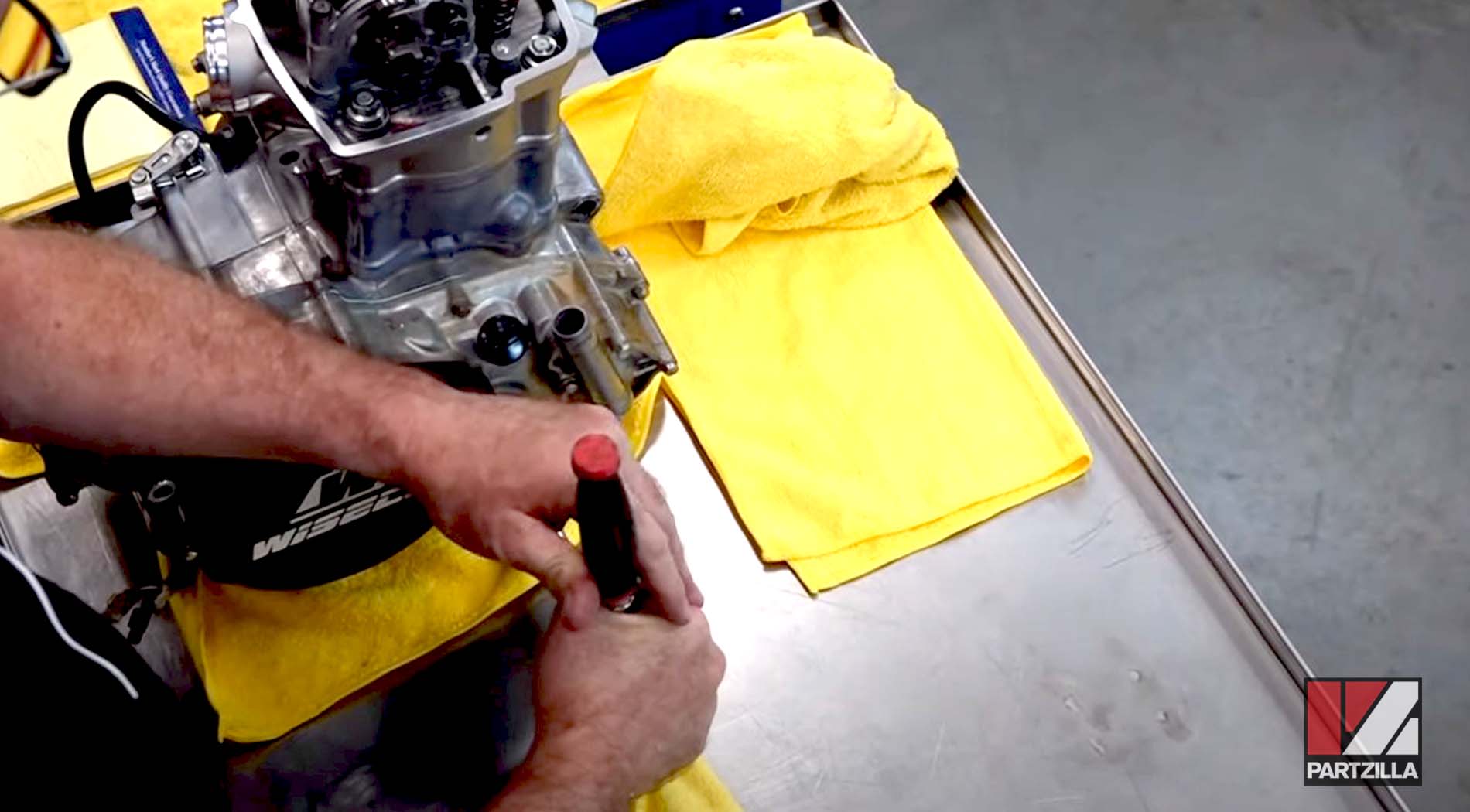 Honda CRF450 engine rebuild inspection plugs
