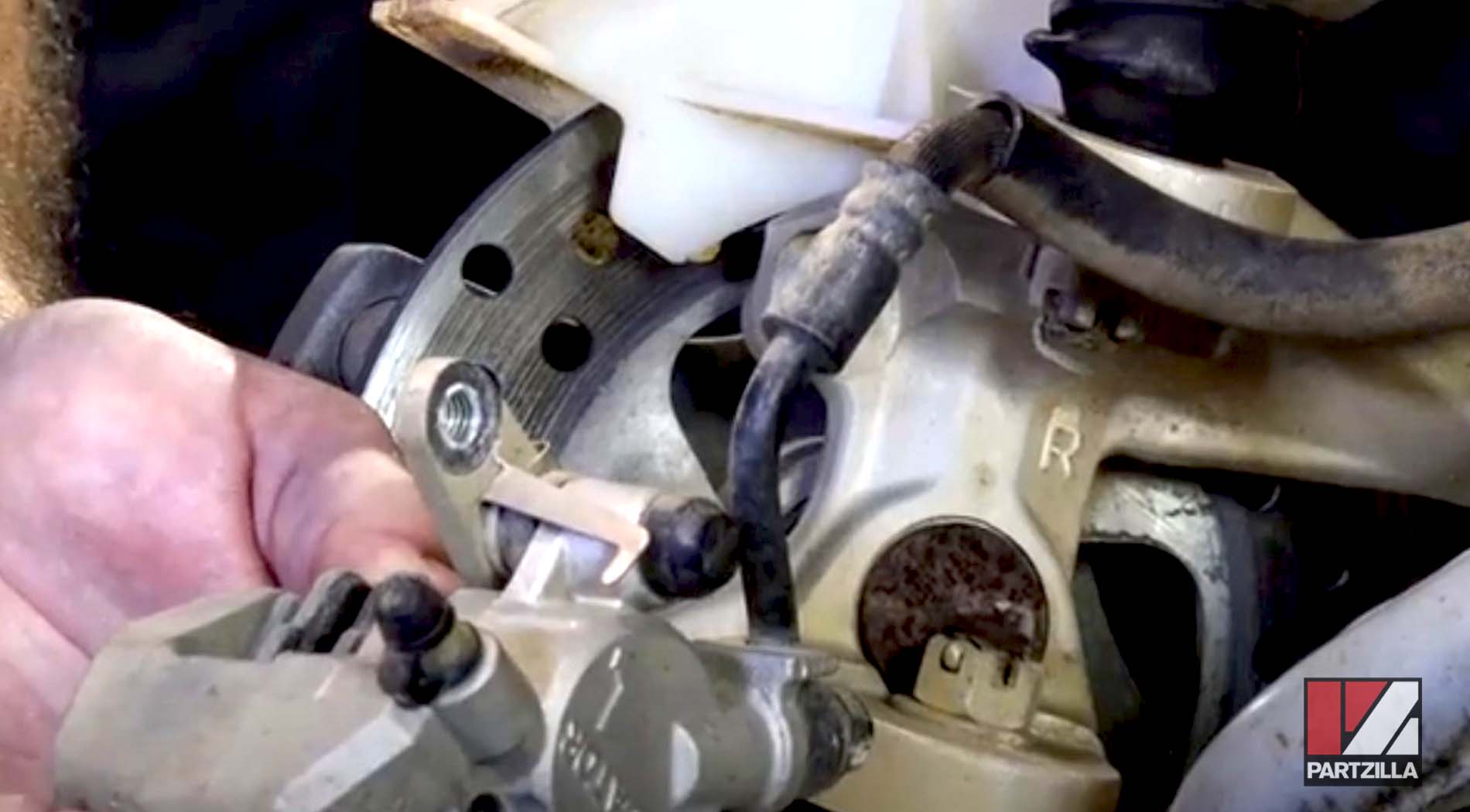 Honda ATV front brake caliper removal