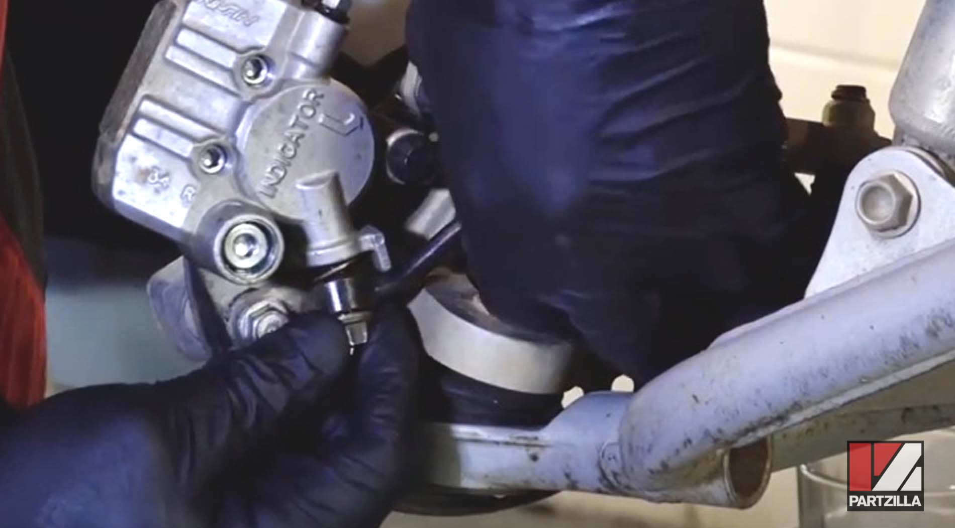 Honda TRX400 ATV brake caliper assembly