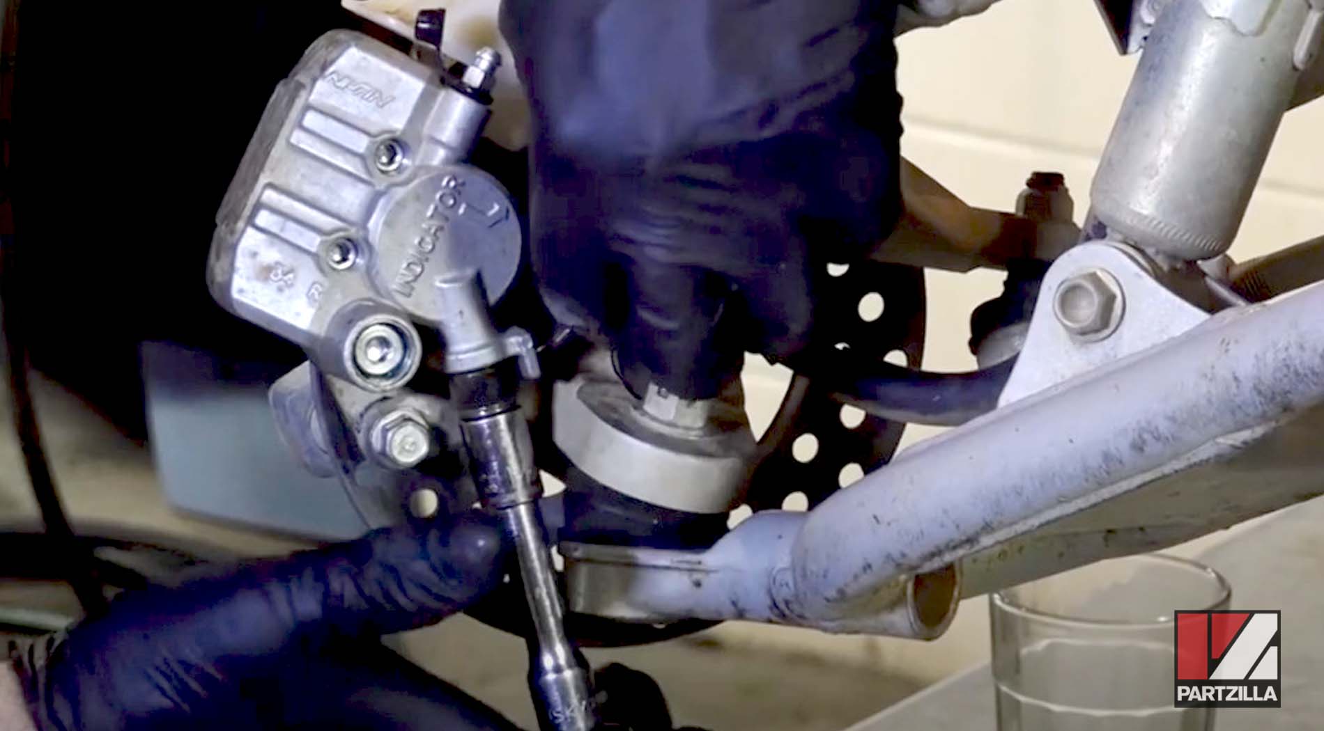 Honda TRX400 ATV front brake caliper rebuild assembly