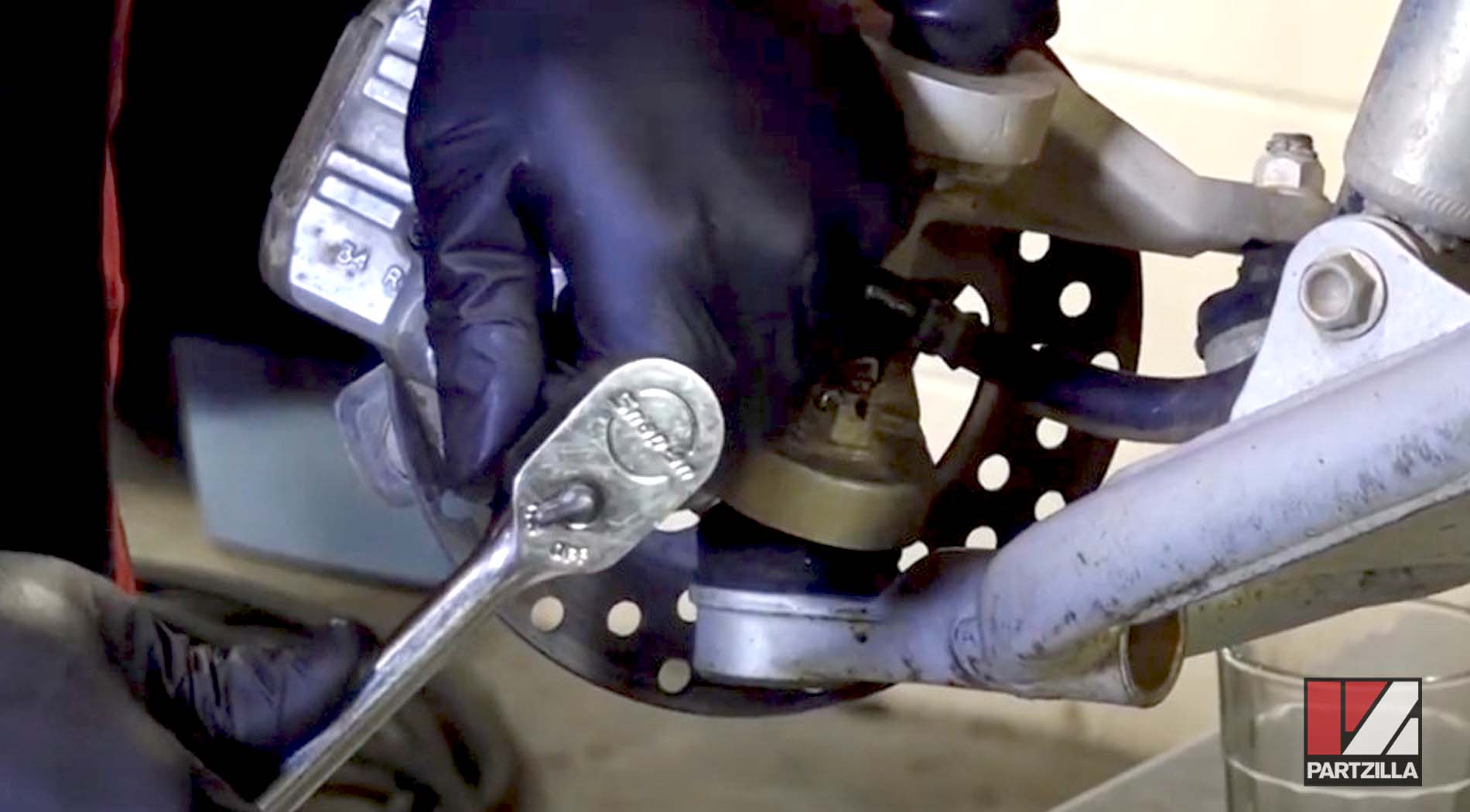Honda ATV front brake caliper rebuild assembly