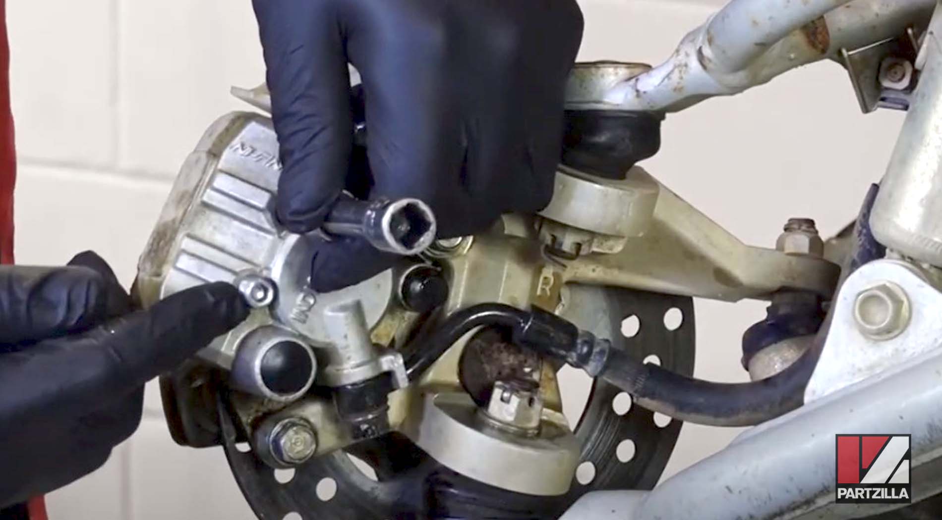 Honda TRX400EX front brake caliper removal