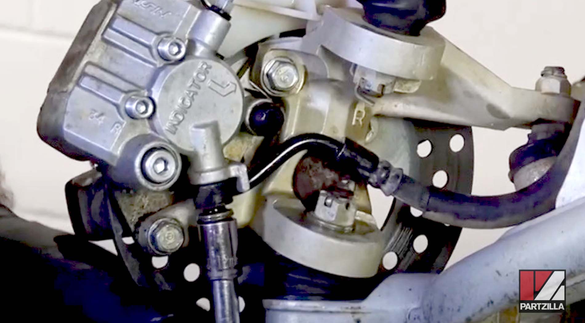 Honda TRX400 ATV front brake caliper removal