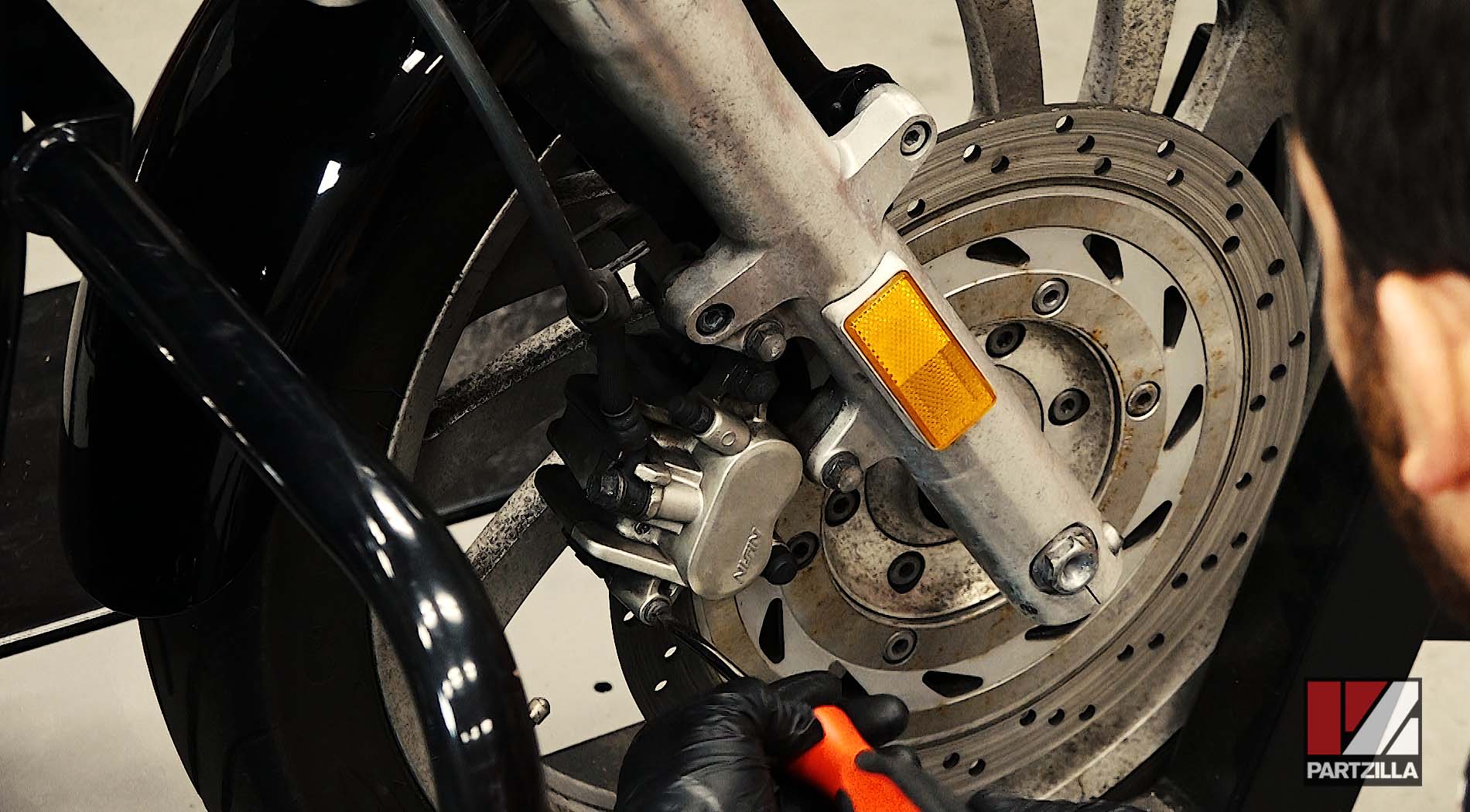 How to change Honda VTX 1300 brake pads