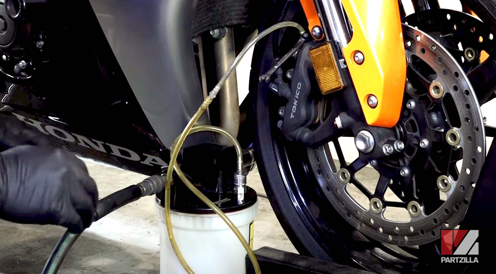 Honda motorcycle front brake bleed vacuum