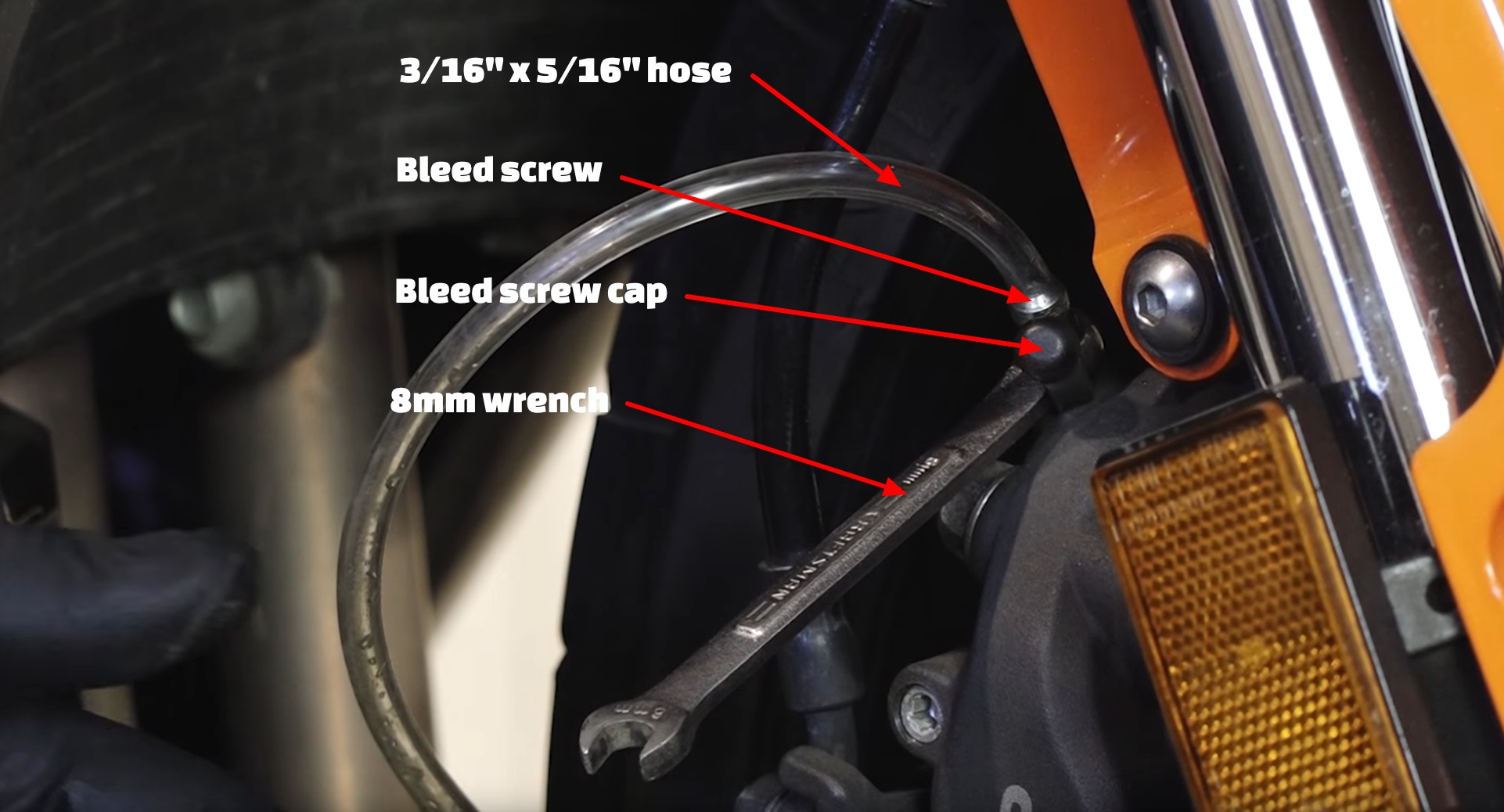 Honda motorcycle front brake bleed manual method