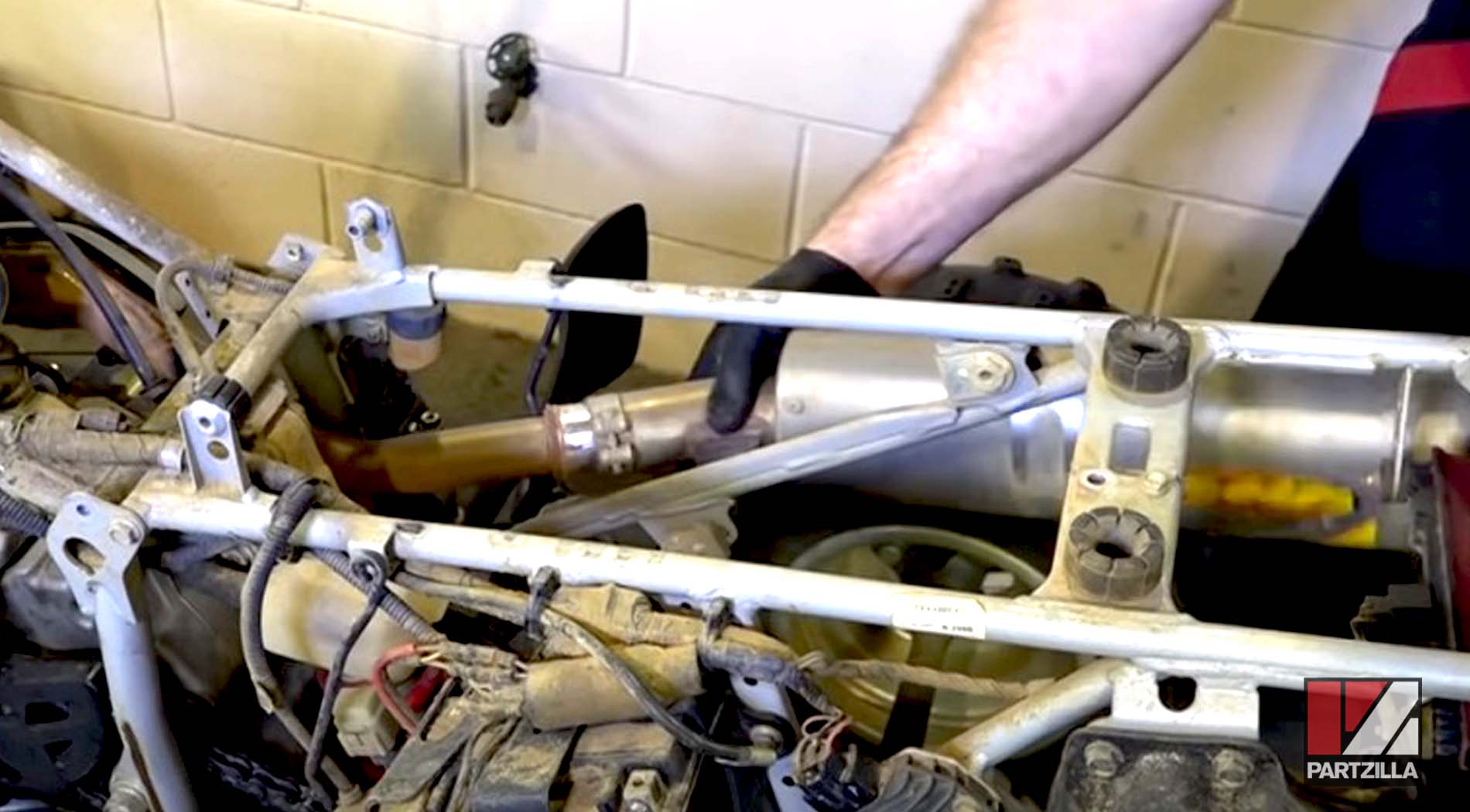 Honda TRX 400 top end rebuild exhaust pipe