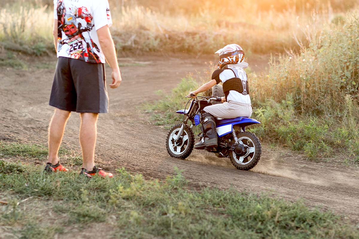 Kid dirt bike riding parent supervision