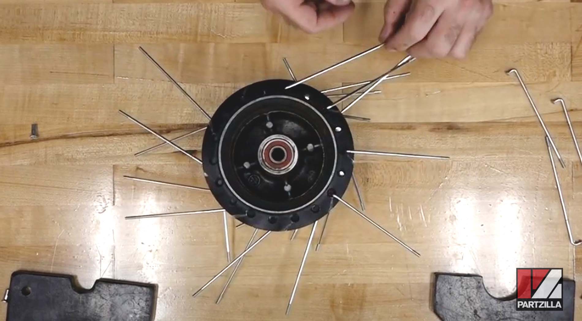 How to lace spokes onto a motorcycle wheel