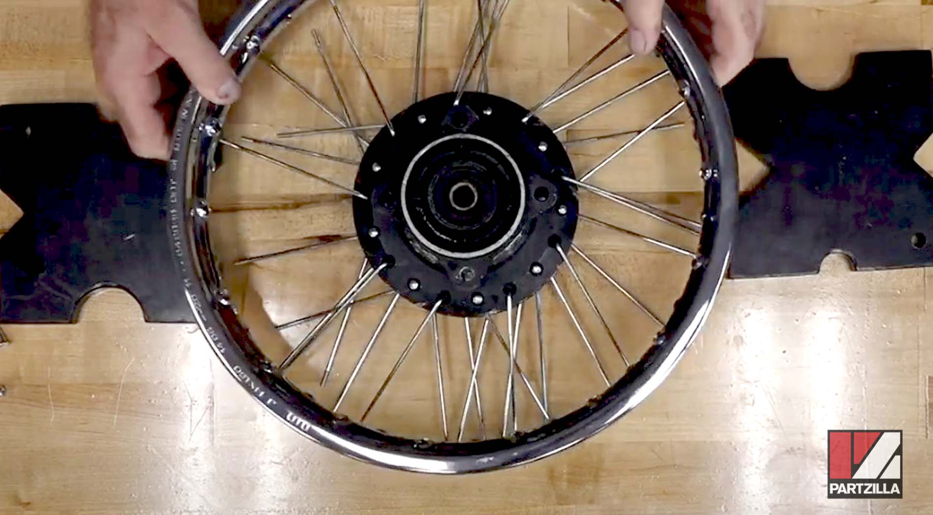 How to lace spokes onto a dirt bike wheel rim