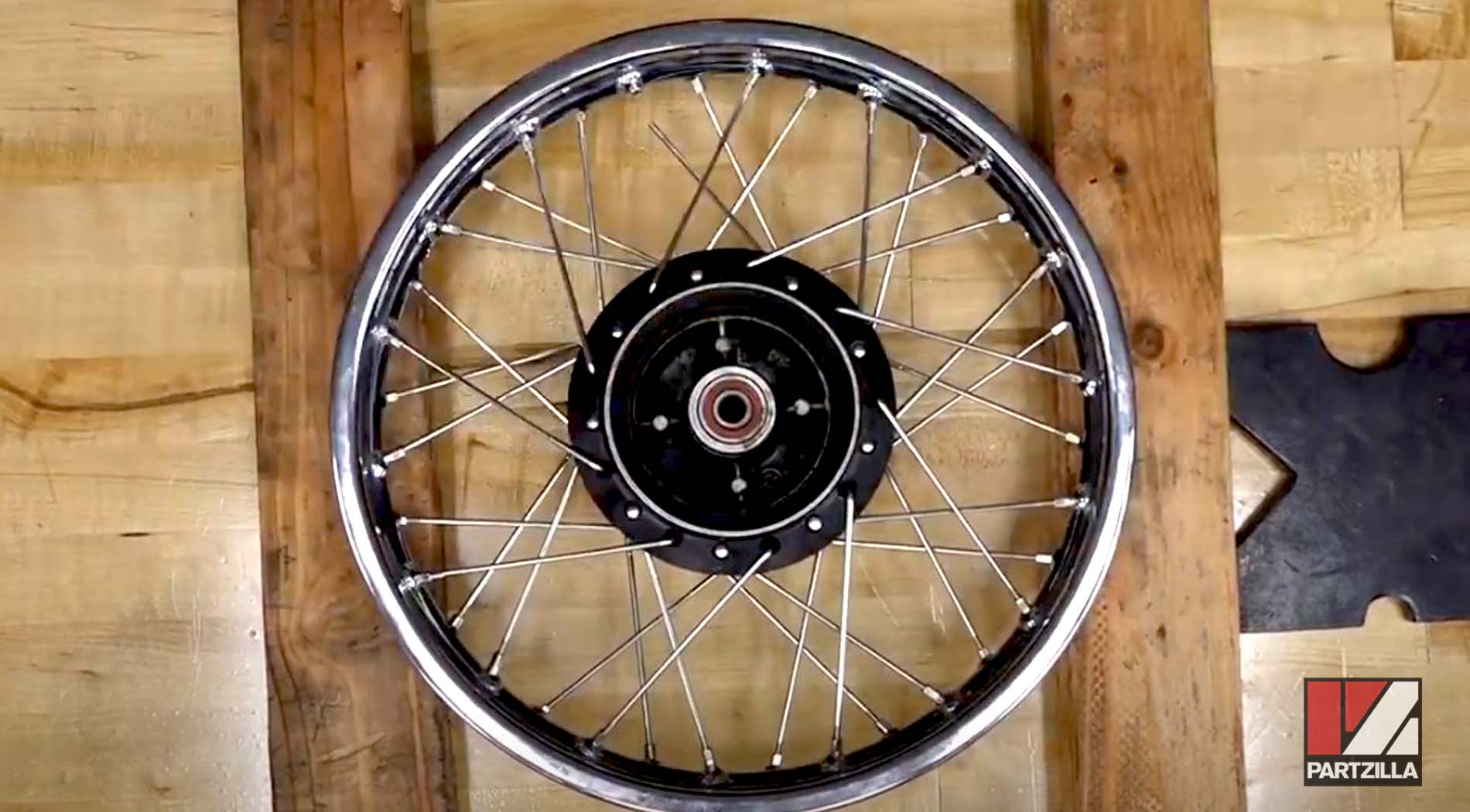 Motorcycle wheel rim spoke lacing