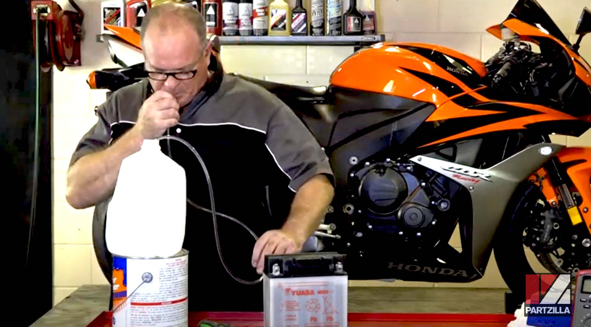 Motorcycle wet-cell battery refill water