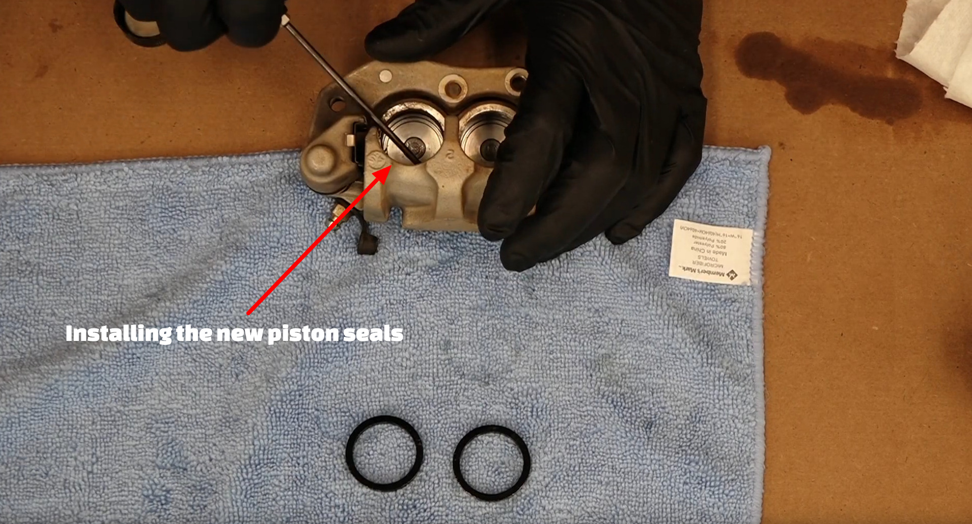 Brake caliper piston seal installation