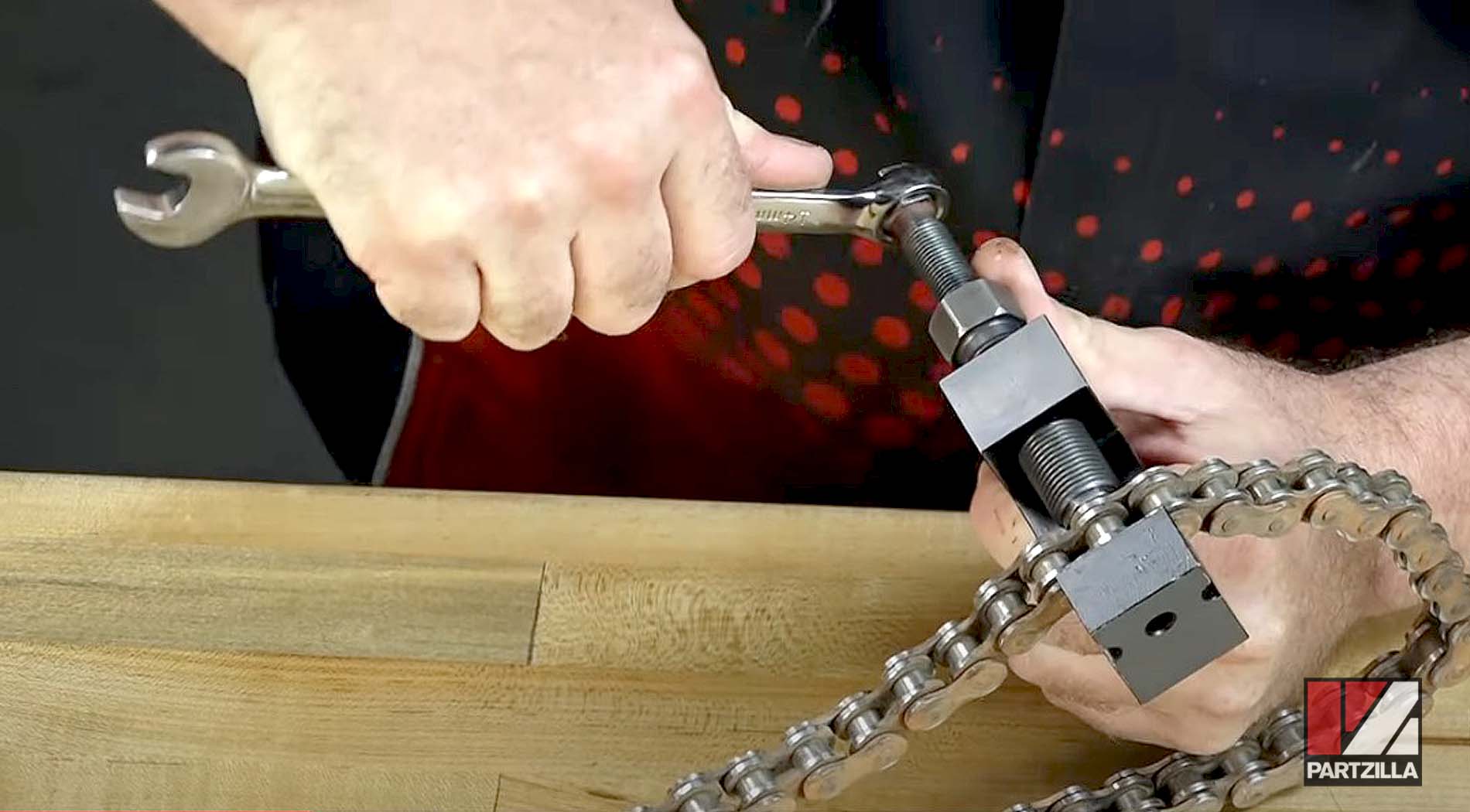 How to use motorcycle chain breaker tool