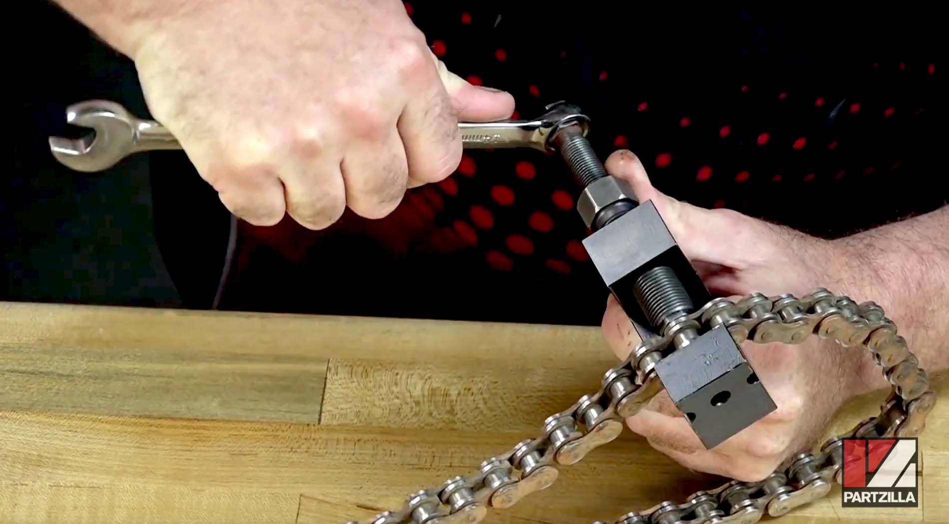 How to use a motorcycle chain tool