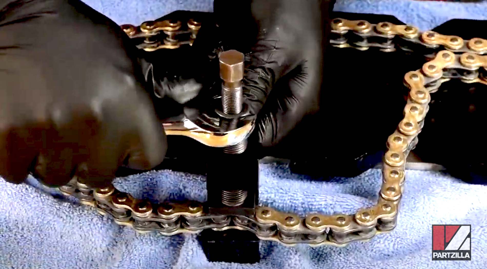 Motorcycle chain tool rivet method