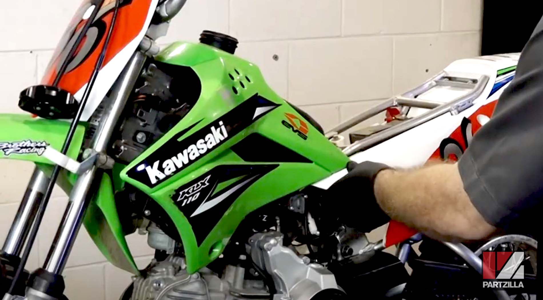 Kawasaki KLX110 dirt bike battery change plastics removal