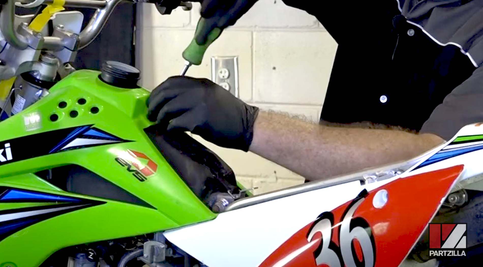 Kawasaki dirt bike battery change plastics removal