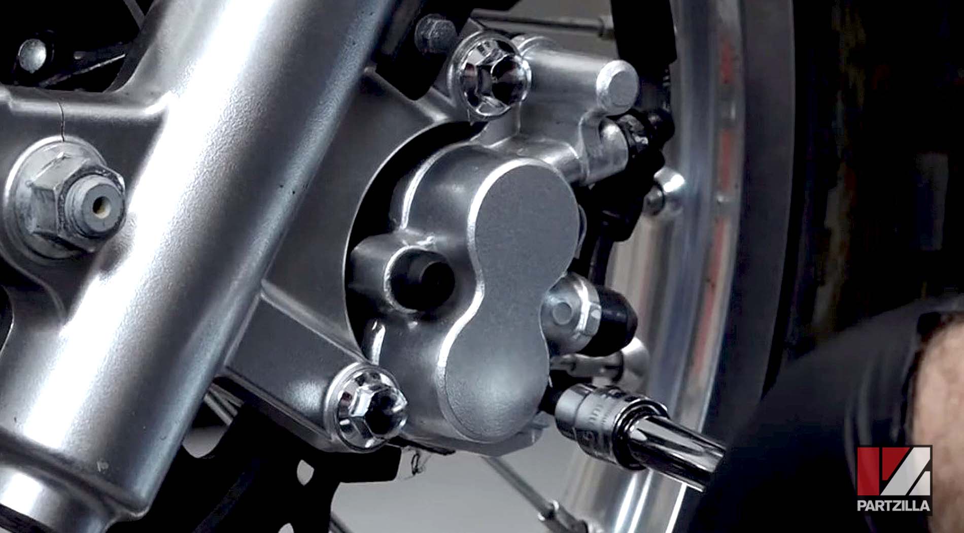 Kawasaki KLR650 dual sport motorcycle front brake pads change