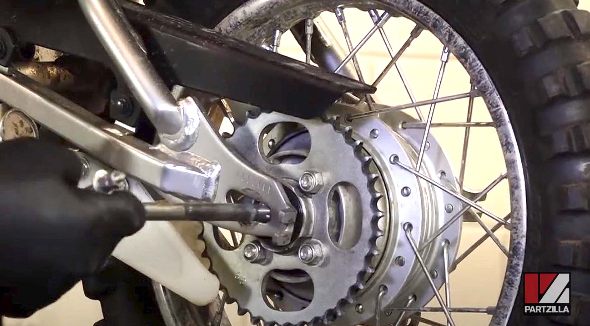 Kawasaki KLX motorcycle drive chain and sprockets removal