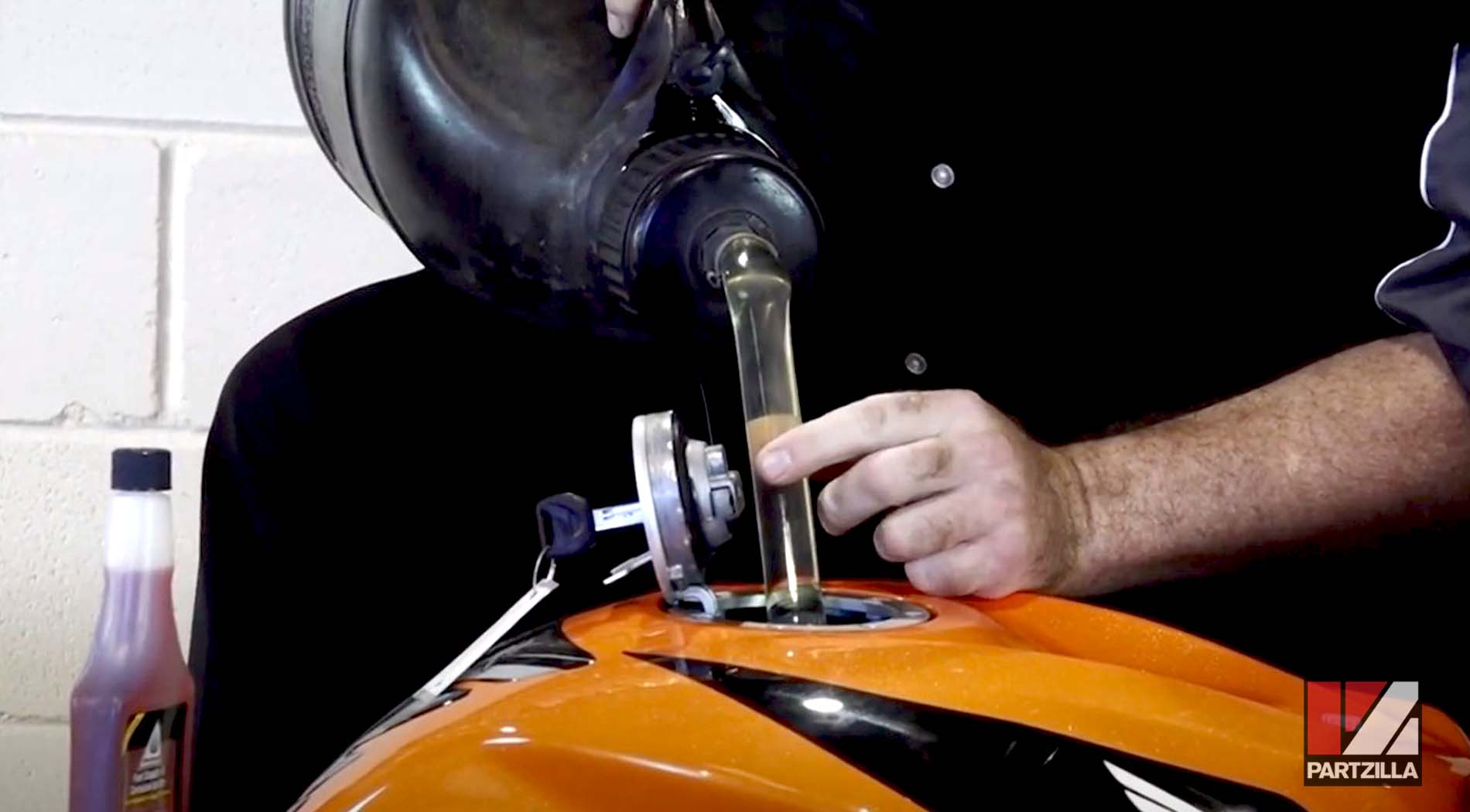 Motorcycle storage maintenance fuel treatment
