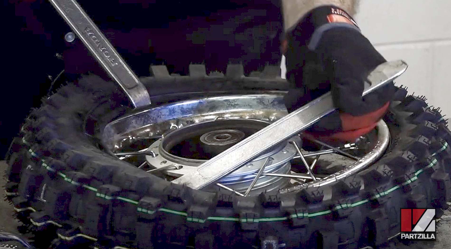 Motorcycle tire wheel balancing reinstall tire to wheel