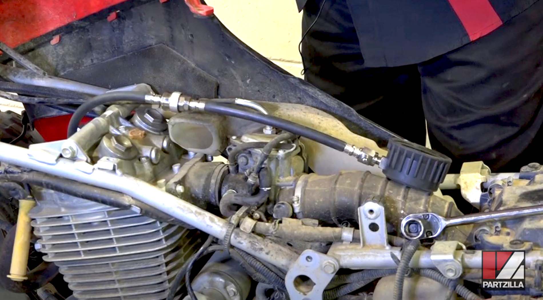 Motorcycle leak down test oil in airbox