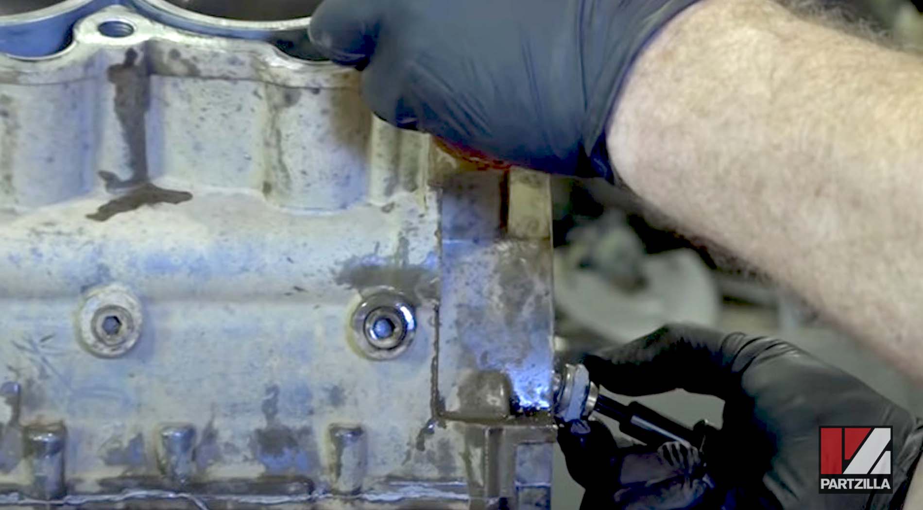 Polaris ATV engine rebuild cam chain tensioner