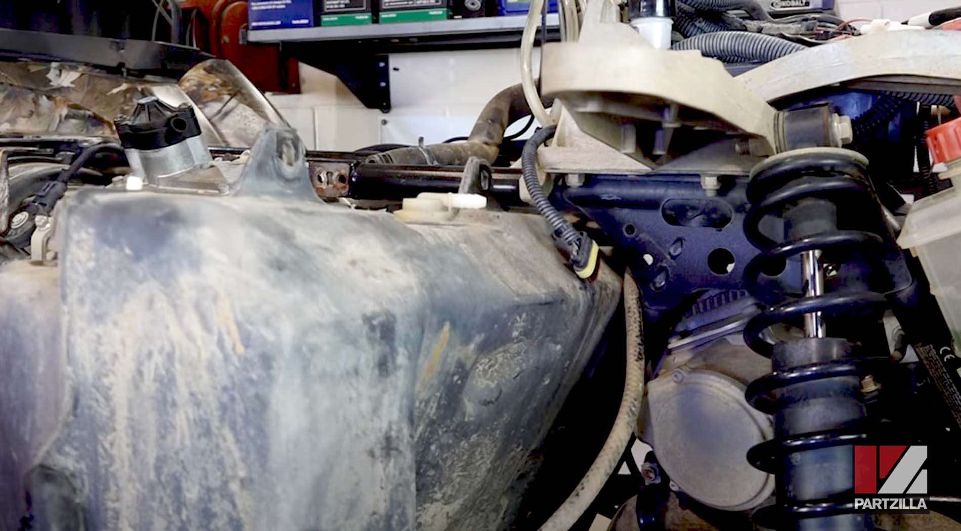 Polaris ATV engine rebuild fuel tank reinstallation