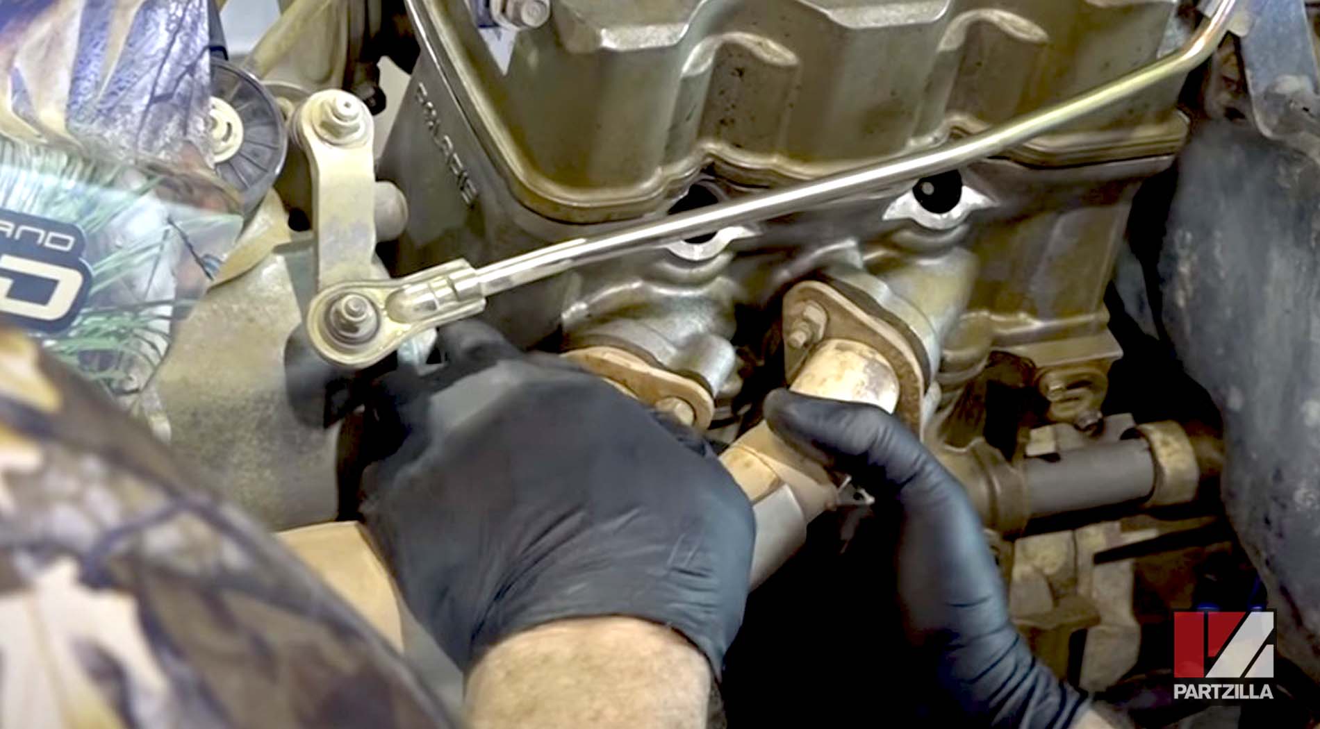 Polaris Sportsman engine rebuild exhaust system installation