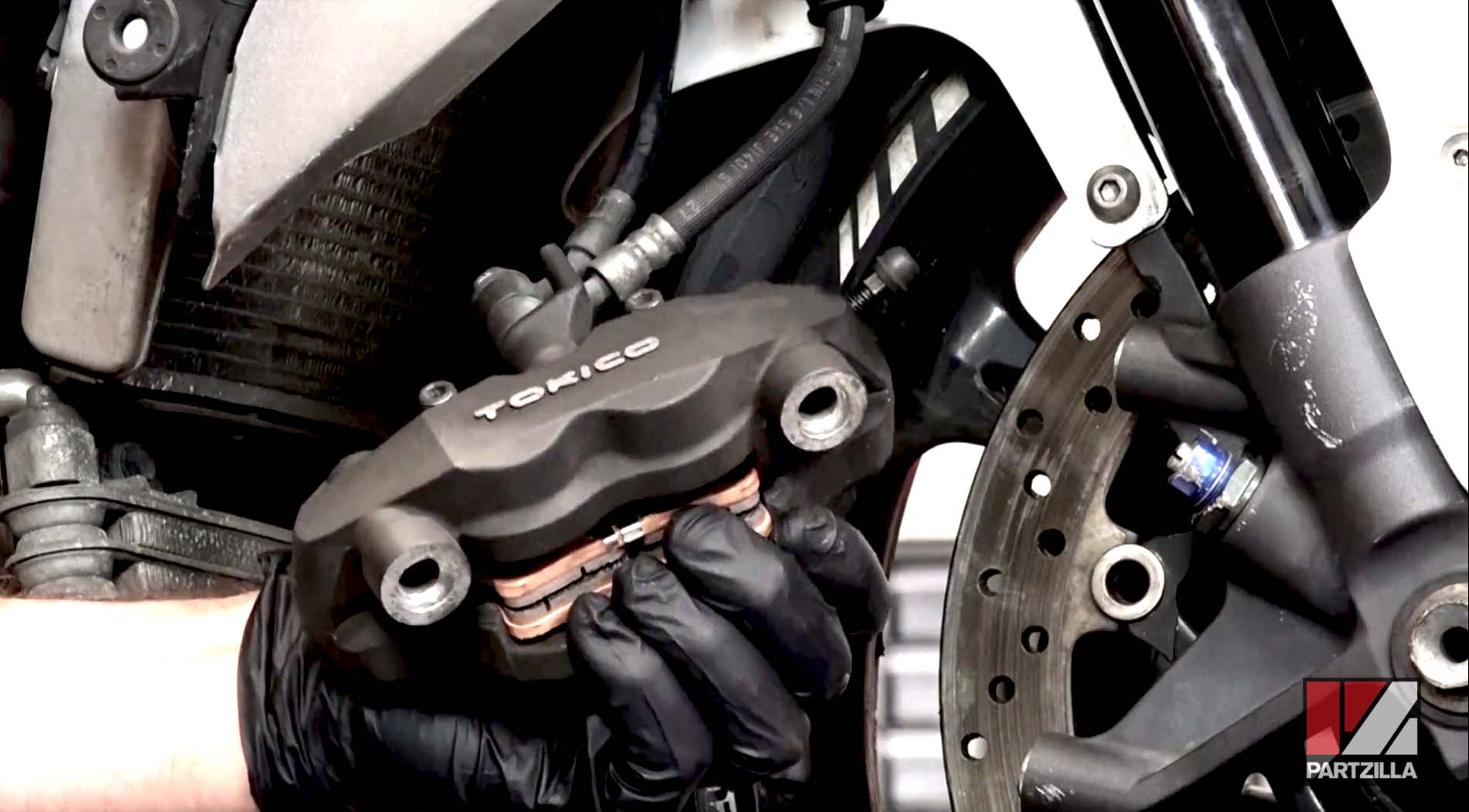 Suzuki motorcycle front brake pads change