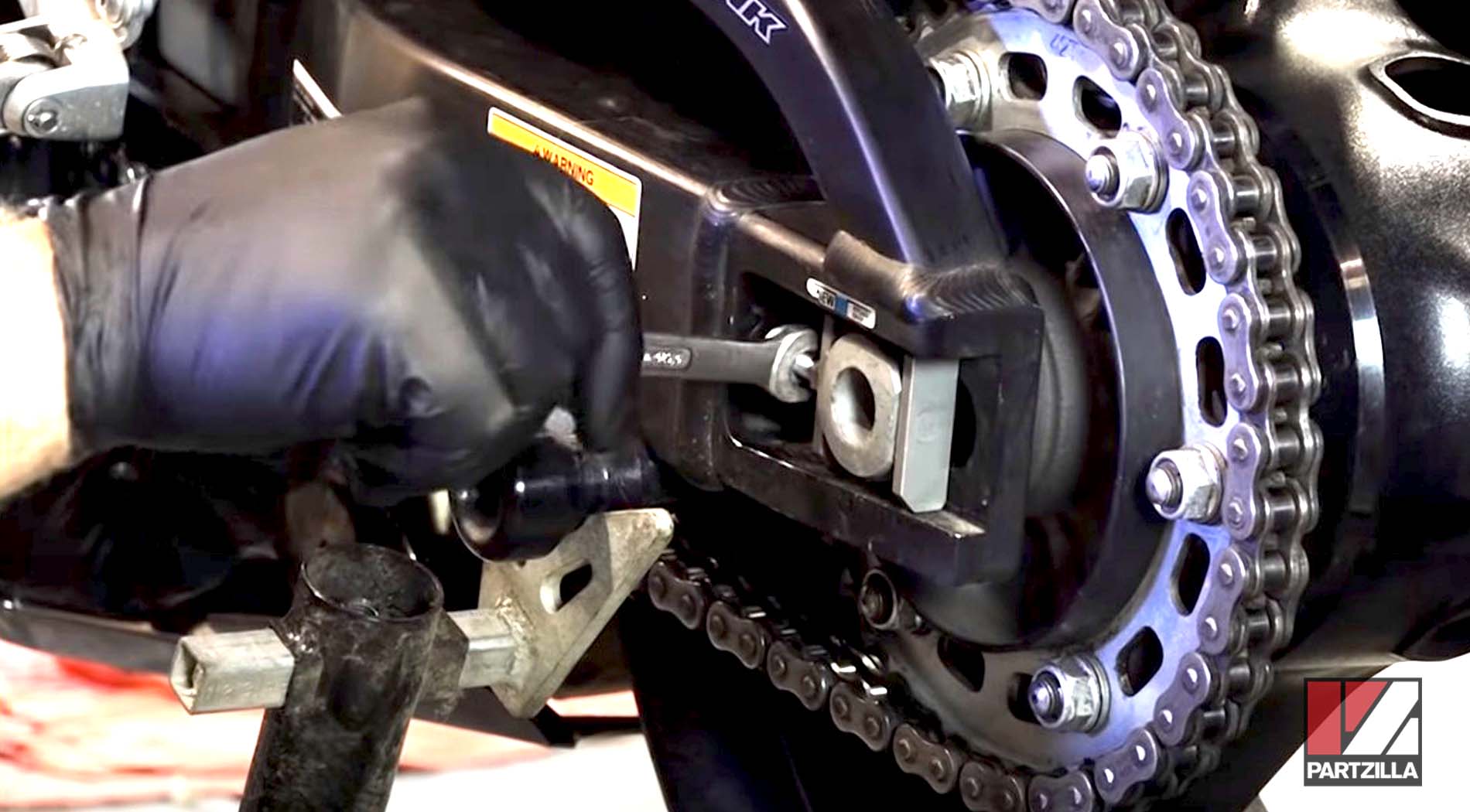 Motorcycle chain adjustment