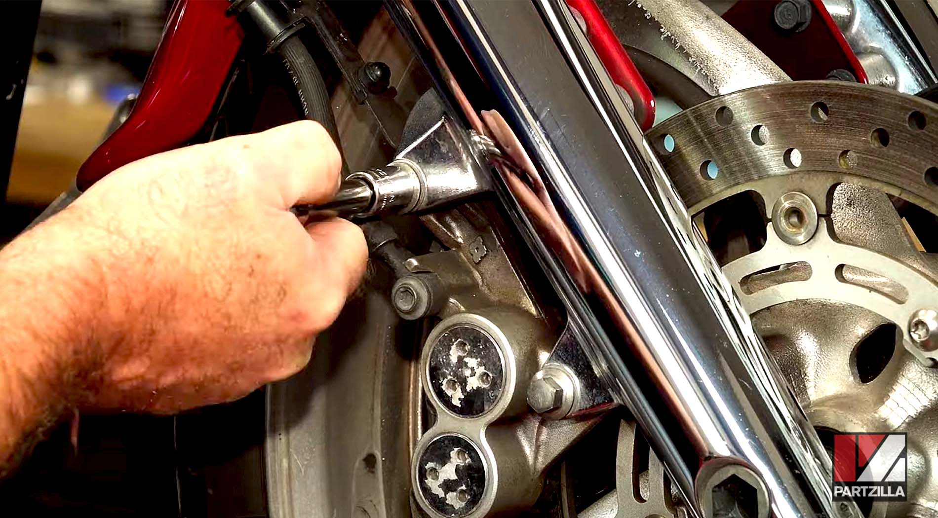 Yamaha Raider front brake pads change caliper bolts