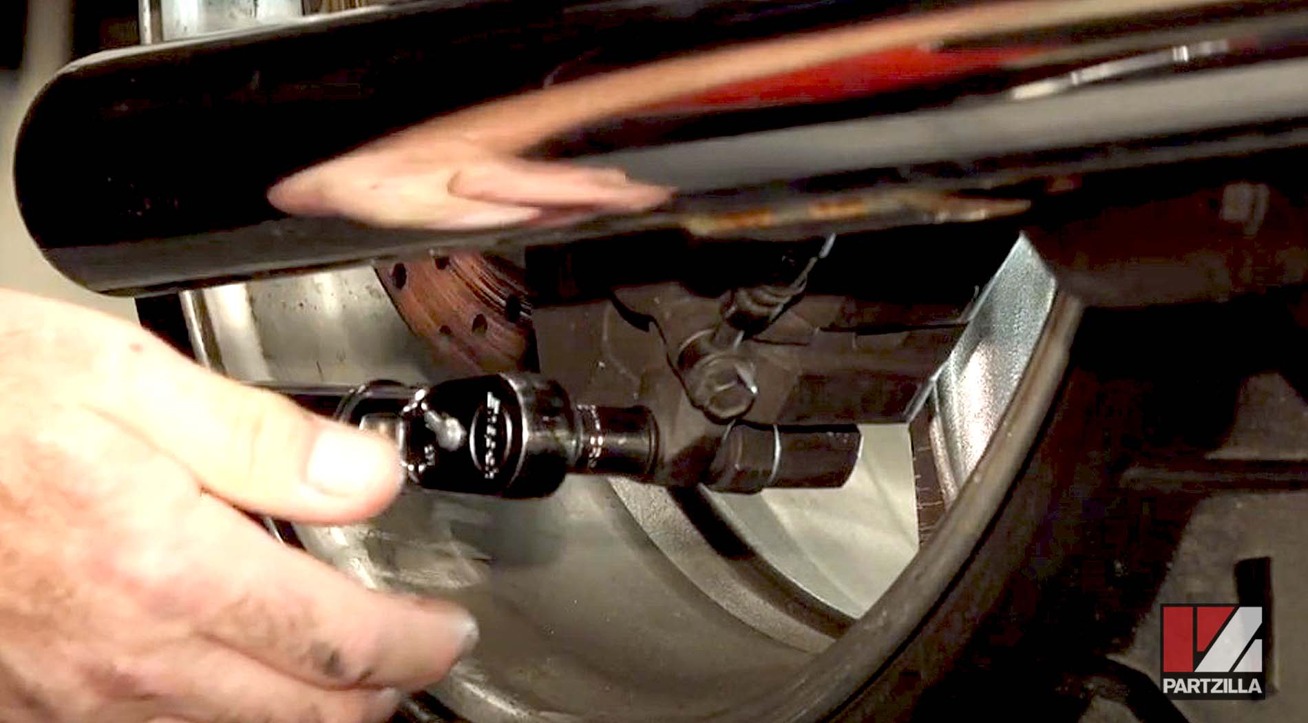 Yamaha motorcycle rear brake caliper bolt installation