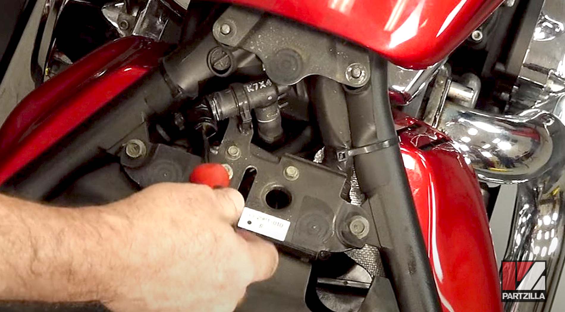 How to change Yamaha Raider spark plugs